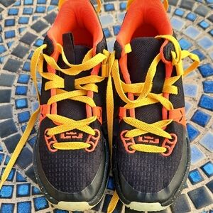 Kids Nike Black and Orange Sneakers